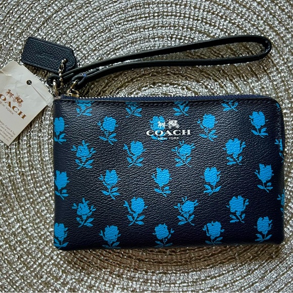 Coach Handbags - Coach Black and Blue Floral Wristlet